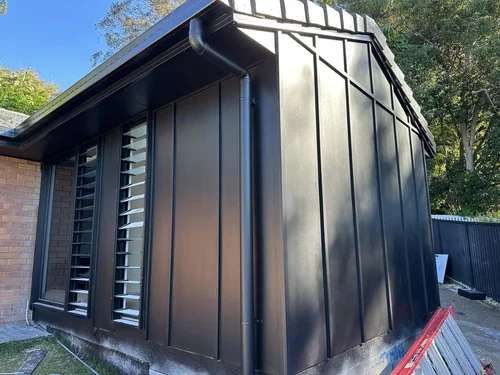 A premium dark exterior home finished by Kenny's Painting